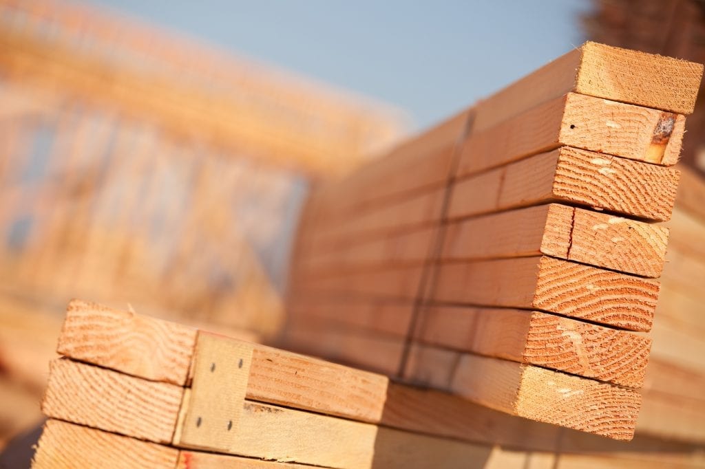 A close up of building materials in a lumber yard in Kelowna